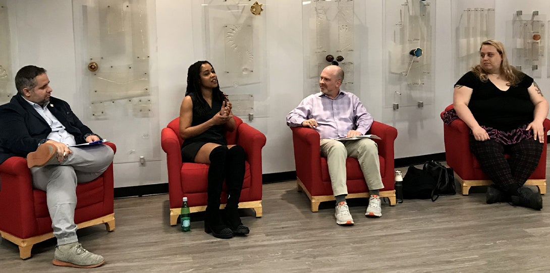 Pride in Business panelists having a conversation about on-the-job queer experiences.